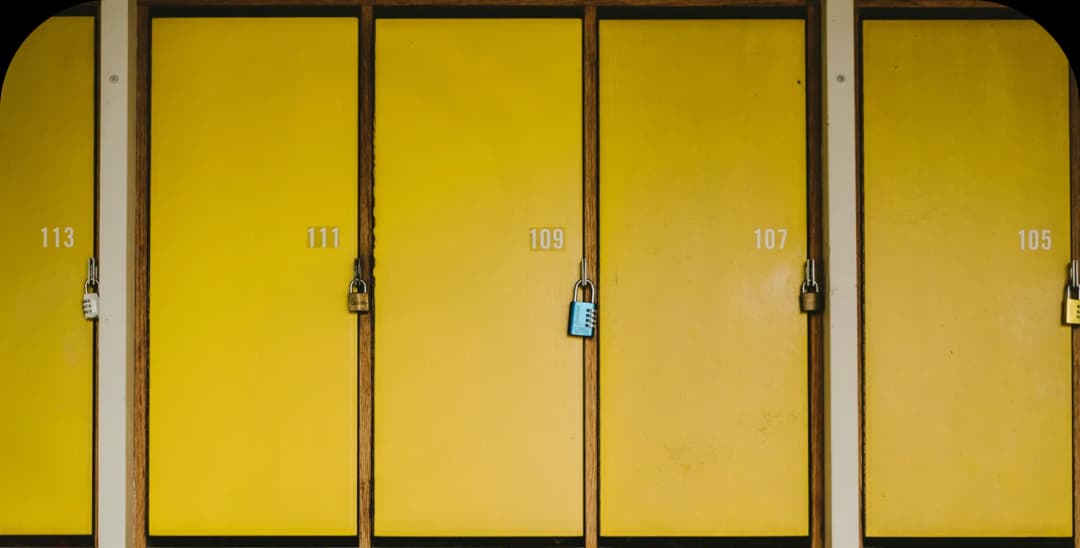 A high level of IT system security works like lockers secured with padlocks — both aim to protect valuable assets from unauthorized access. Just as a padlock requires the correct key, IT systems use authentication and authorization mechanisms to ensure that only authorized individuals have access to data and resources.