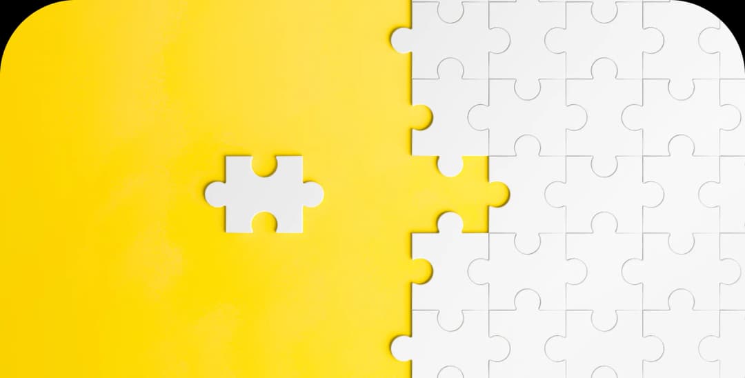 Assembling puzzles can be compared to DevCare understood as enterprise services, where each piece has its place, symbolizing project management as a collection of precisely aligned actions that come together to form a complete picture.